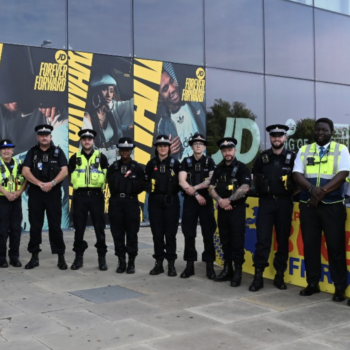 Walkden Neighbourhood Policing Team and security staff standing together outside Walkden Town Centre
